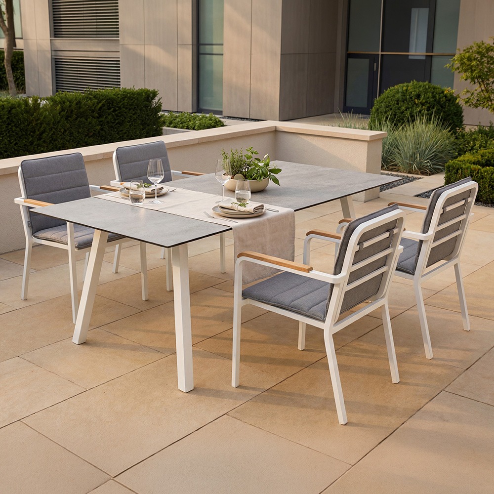 Stern PEPE Aluminium Set 9-teilig Pepe Aluminium weiß mit 4 Stapelsesseln, 4 Auflagen seidengrau und einem Tisch Interno 180x100cm stone light