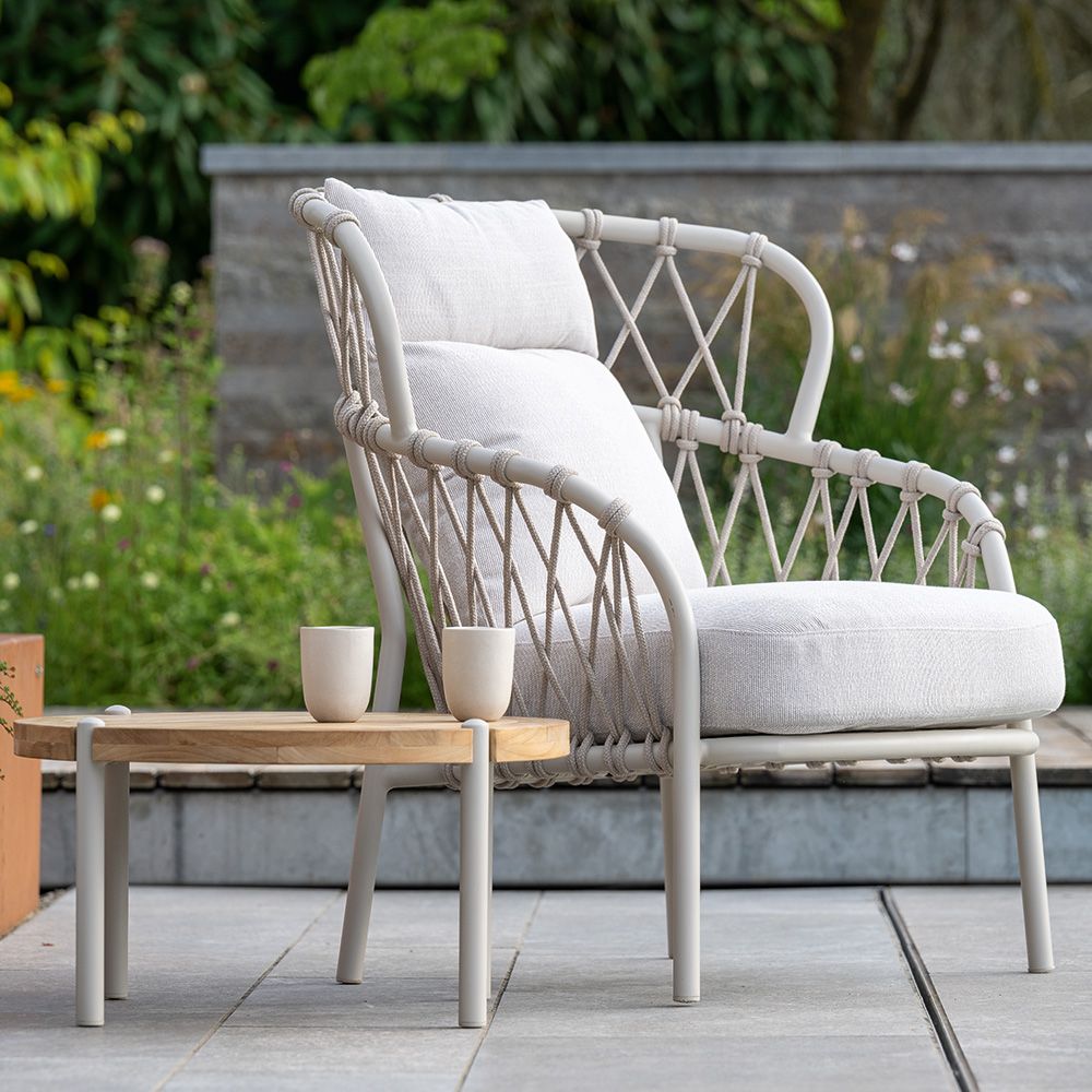 Stern Pfauen-Sessel Klea Aluminium greige Kordel greige Kissen Vanilla mit Beistelltisch Taro ø 65x35