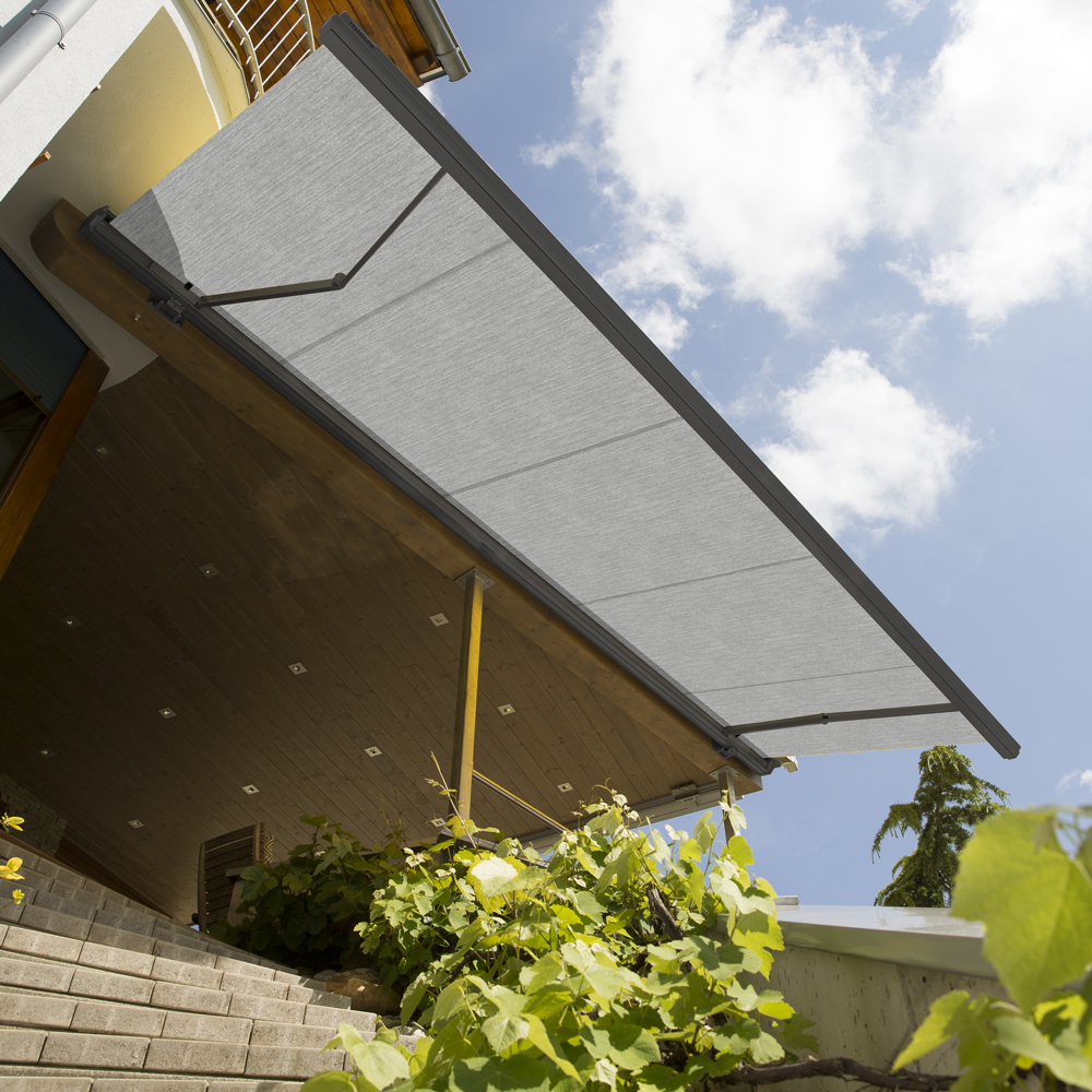 Vollkassettenmarkise K350-DELUXE | 5,5x3,5 m | Stoff: Uni, grau meliert | Gestell: Anthrazit | SOWERO Vollkassettenmarkise Funkmotor inkl. Handsender